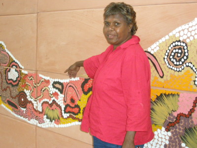 Gabriella Possum discussing her painting, Grandmother's Country- Bush Tucker Dreaming.